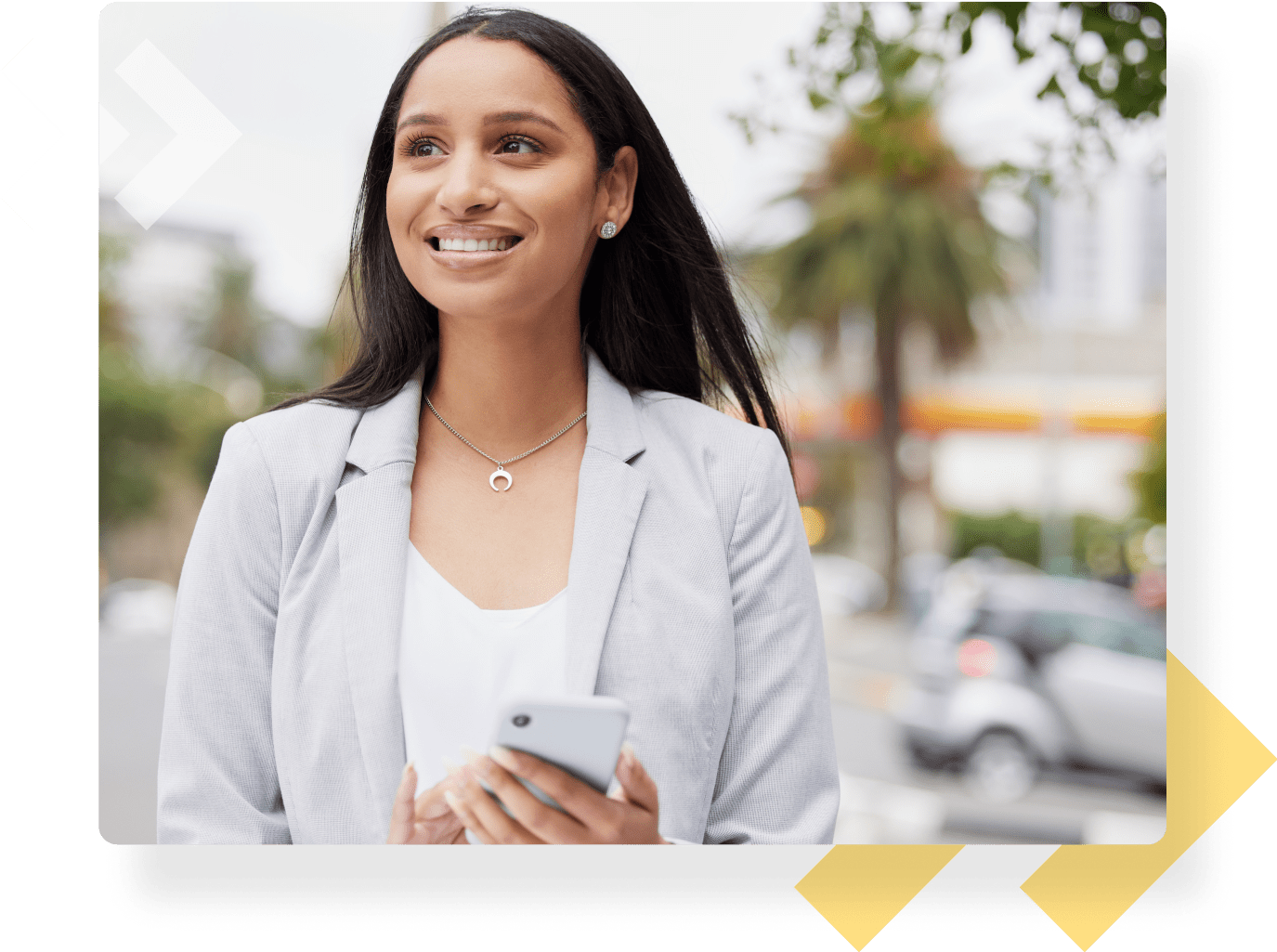 A young woman using her phone to access her property management parking permit