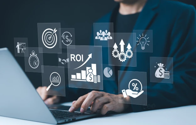 Person working on a laptop with an ROI chart and business icons overlaid